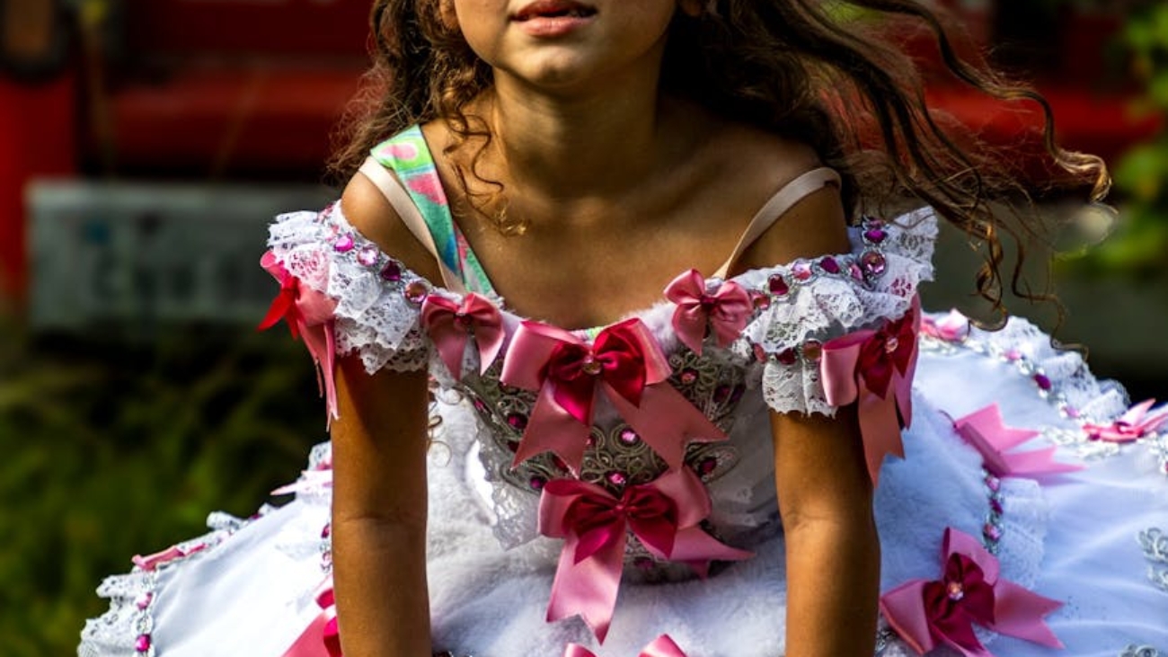 young girl in princess dress outdoors