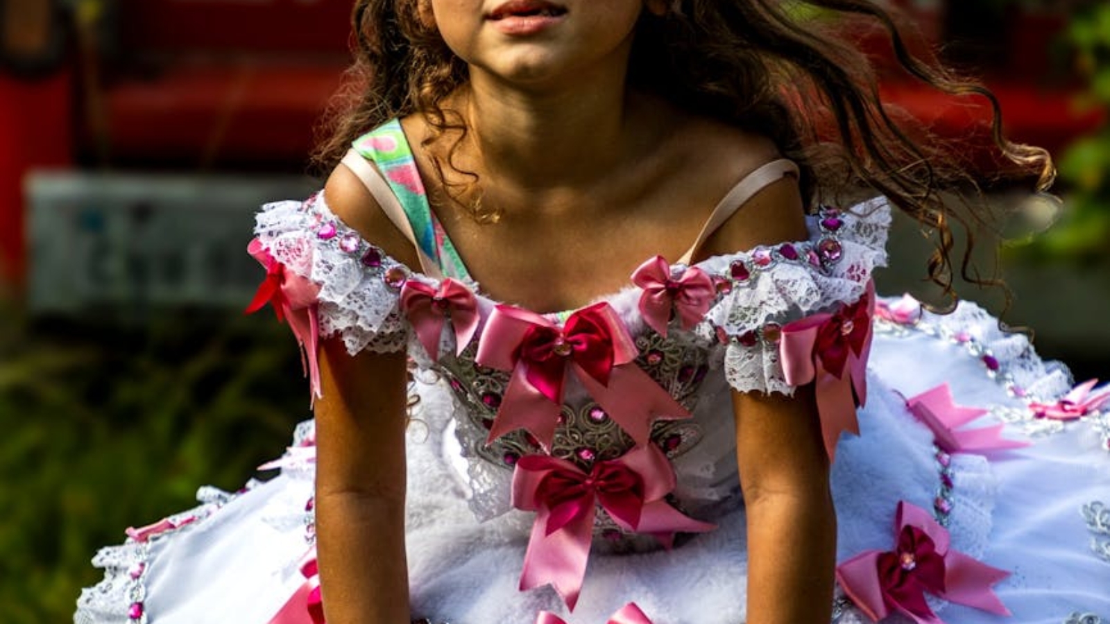 young girl in princess dress outdoors